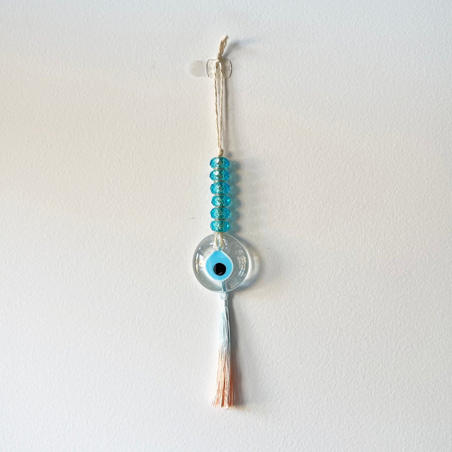 CLEAR EVIL EYE  BEADED WITH  GRADIENT TASSEL - XSMALL